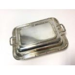 1930s silver entree dish with a crenellated border and separate cover with twin handles