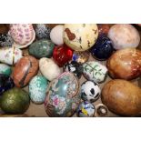 Collection of large decorative eggs, including signed art glass eggs, wooden and specimen stone, tog