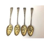 Four Georgian silver berry spoons