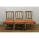 Set of three 19th century painted salon chairs, each with bar back and cushion seat on turned fluted