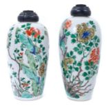 A near pair of Chinese famille verte ovoid porcelain vases, Kangxi (1662-1722), decorated with flowe