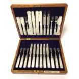 Late Victorian canteen of silver fruit / dessert cutlery comprising twelve knives and twelve forks,