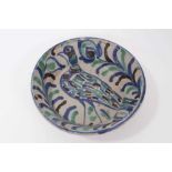 Persian/Middle Eastern tin-glazed pottery bowl, painted with a bird and a foliate pattern in blue, g