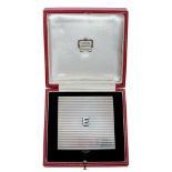 Lady Elizabeth Shakerley C.V.O. (1941-2020), Cartier silver powder compact of square ribbed form wit