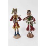 Pair of early 20th century Indian figures with glass beadwork decoration