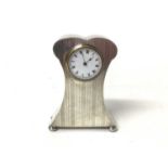 George V silver mounted dressing table clock in shaped case with reeded engine turned decoration, ra