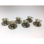 Set of six American sterling silver coffee cups and saucers with porcelain cup liners