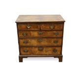 George I walnut veneered chest of two short snd three long drawers with crossbanded decoration and b