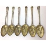 Six Georgian silver berry dessert spoons with matching decoration