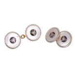 Pair of Art Deco 18ct gold dress cufflinks, the circular mother of pearl disc centred with a diamond