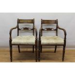 Pair of Regency mahogany open elbow chairs