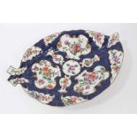 A Worcester cabbage leaf shaped dish, with flowers on a blue scale ground, circa 1770