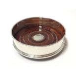 Contemporary silver wine coaster of plain circular form (Sheffield 2000 Millennium mark),