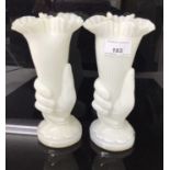 Pair of Victorian opaque glass vases, in the form of a hand holding a flower, 21.5cm high