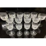 Set of ten good quality cut glass port/sherry glasses, together with four matching liquor glasses (1