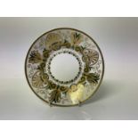 Regency period Spode porcelain saucer dish with good quality gilt and green decoration on white grou