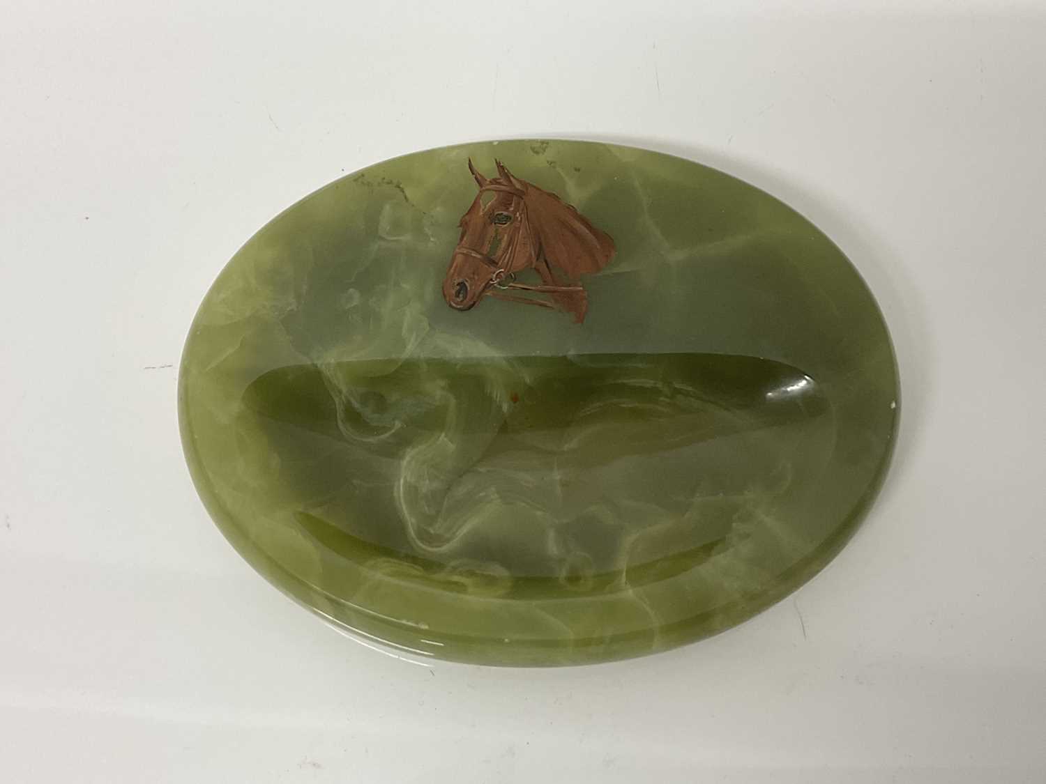 Early 20th century green onyx pin dish of oval form painted with the head of a horse, 11cm x 14cm