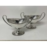 Pair of 19th century silver plated two handed dishes of navette form with loop handles and gadrooned