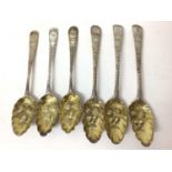 Set of three Georgian silver berry dessert spoons and three further similar