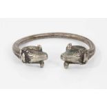 Persian silver/white metal torque bangle with rams head terminals