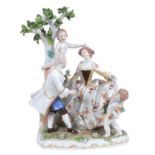 Vienna porcelain group, late 19th/early 20th century, in the form of a courting couple and two putti