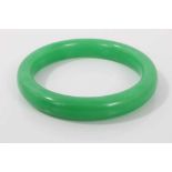 Chinese green hardstone bangle, approximately 55mm diameter