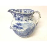 Large Victorian blue and white wash jug decorated with tyrolean landscapes, 29cm high