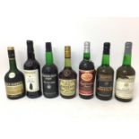 Seventeen assorted bottles to include: Royal Occasion Sherry, Silver Jubilee, Cognac, Port, Gin and