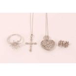 Group 9ct white gold diamond set jewellery to include heart locket on chain, cross pendant on chain,