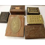 Porcupine quill box together with other carved wood boxes and a faux-marble box