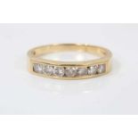 18ct gold diamond seven stone half eternity ring in channel setting