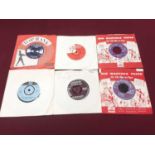 Vintage case of single records including Elvis Presley 45-POP 359 (silver x 2), Eddie Cochran (Tri 4