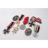 Collection of replica Second World War Nazi badges and decorations to include Iron Cross (second cla