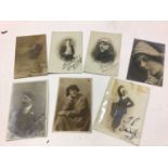 Group of early motor racing and music hall postcards