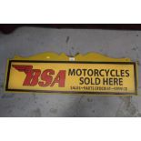 Wooden plaque with applied reproduction vinyl sign 'BSA Motorcycles Sold Here', 102cm in length