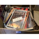 Box of music memorabilia including Beatles, press cuttings, ephemera, canvas images, concert tickets