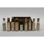 Group of old poison vials in mahogany case