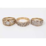 Three 9ct gold diamond set pierced band rings