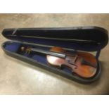 Antique violin with two-piece back, spurious Stradivarius label, in wooden case