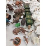 Collection of animal sculptures including Elephants, Bison, Wolves etc