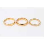 Two 22ct gold wedding rings and 18ct gold wedding ring (3)