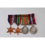 Second World War medal group comprising 1939 - 1945 Star, Pacific Star, Defence and War medals (moun