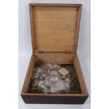 Large collection of antique watch crystals / glasses together with a box of watch parts