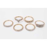 Six 9ct gold diamond set half eternity style rings