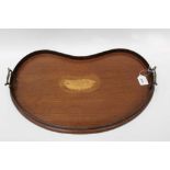 Kidney shaped mahogany tray with two brass handles, galleried edge and inlaid shell design, 55cm lon