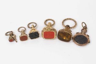 Collection of six antique hard stone seals in gilt metal mounts