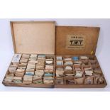 Four wooden boxes of vintage new old stock watch glasses, various sizes and accessories