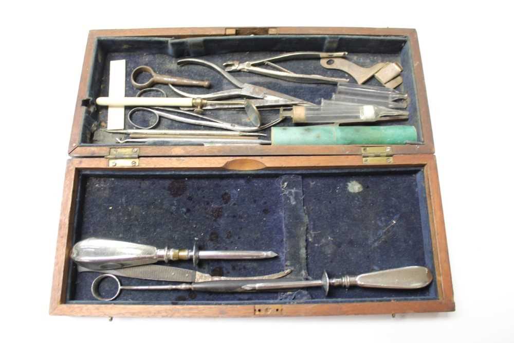 A surgical knife with ebony handle, signed Evans, together with an enema and assorted medical / dent