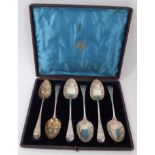 Pair Georgian silver berry spoons together with four Victorian silver plated tablespoons in fitted c