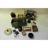 Two vintage tins containing various buttons, other sewing items and sundries